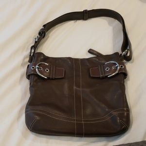 Brown leather coach bag